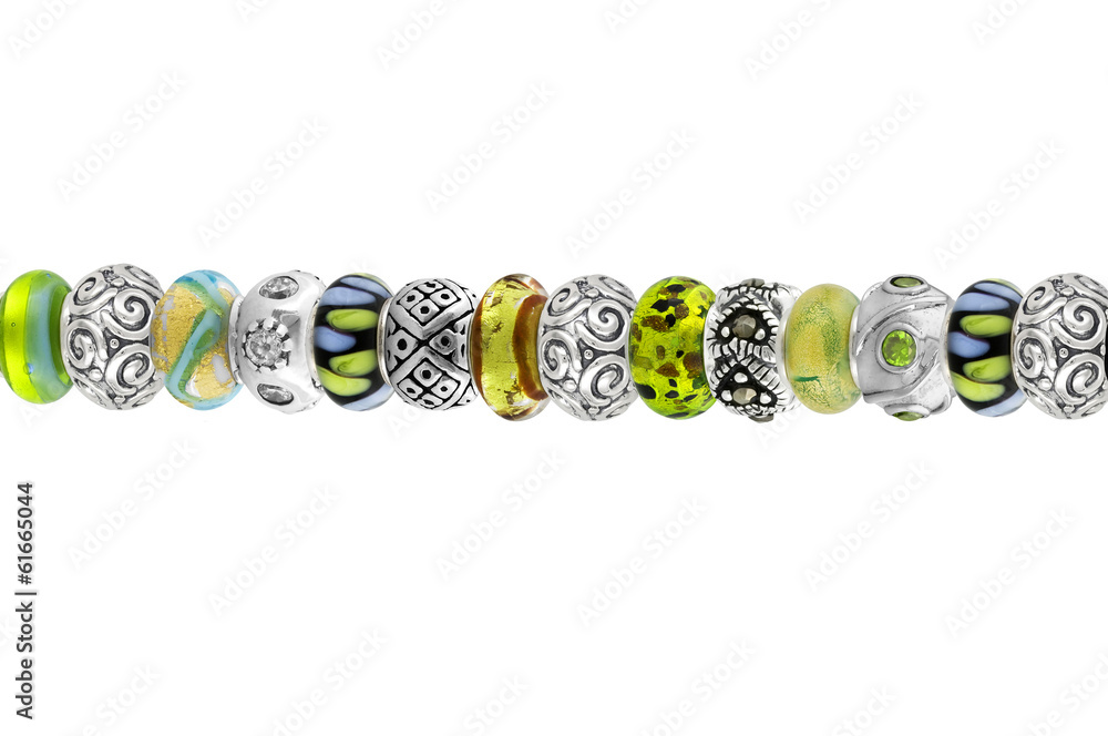 Beautiful silver bracelet with precious stones isolated on white Beautiful silver bracelet with precious stones isolated on white