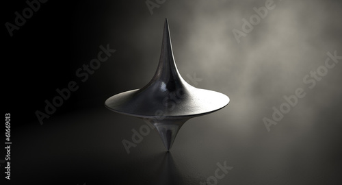 Die Cast Spinning Top Silhouetted photo