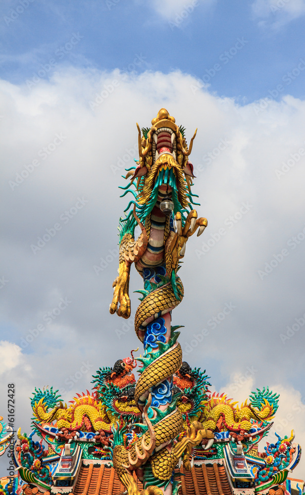 Chinese Dragon wrapped around blue pole
