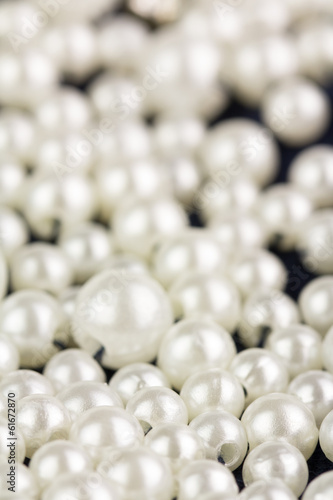 Pearl beads sewn on garment