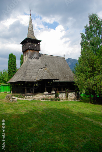 Monastery Dragoslavele. Traditional wood church from Romania. photo
