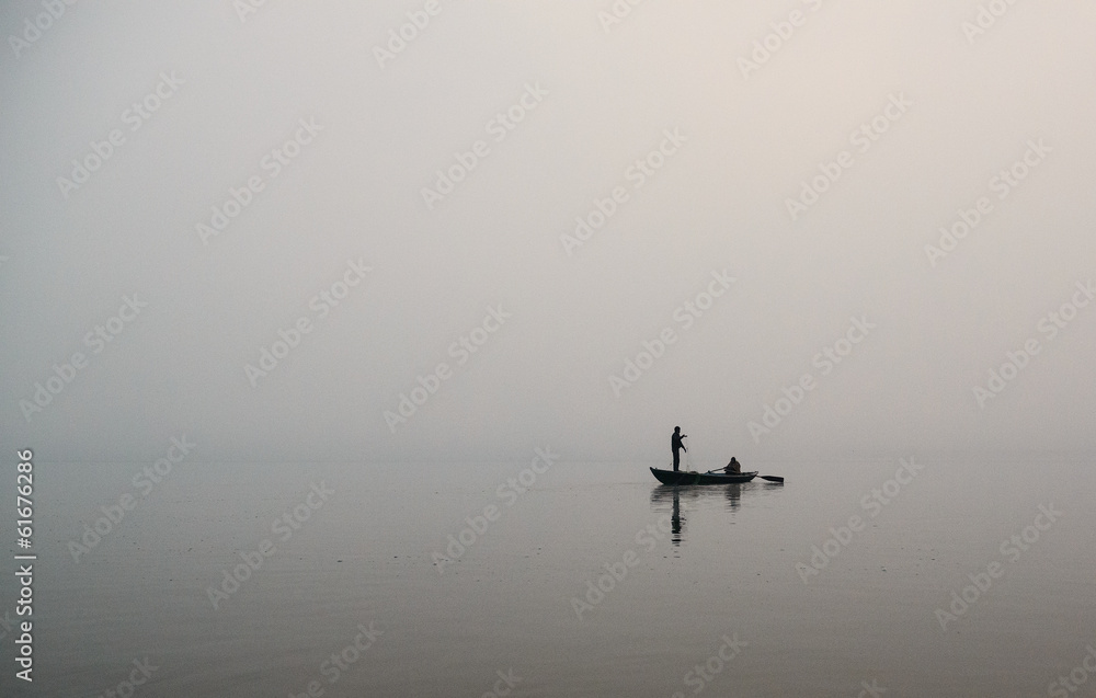 Fototapeta premium lone fisherman in the river