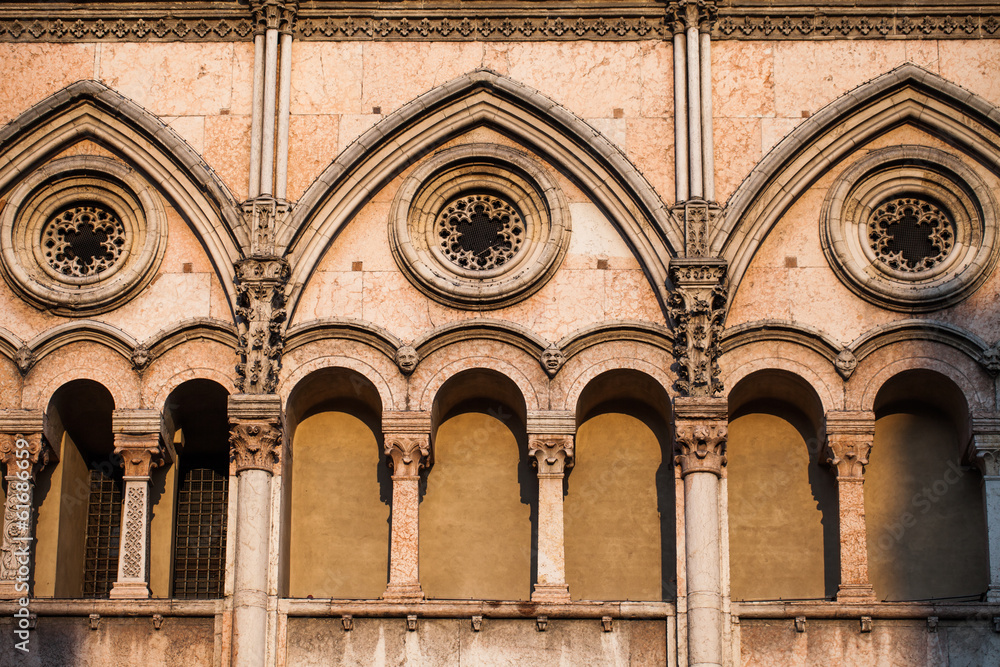 Ferrara, ITALY -  Part of facade of Cathedral sculpture