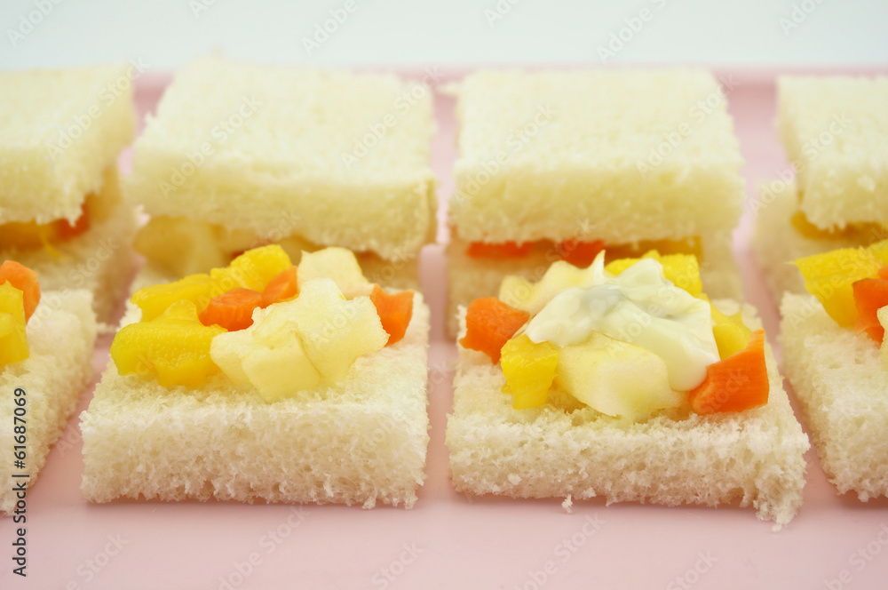 Small sandwich mango apple carrot cucumber bread cream salad