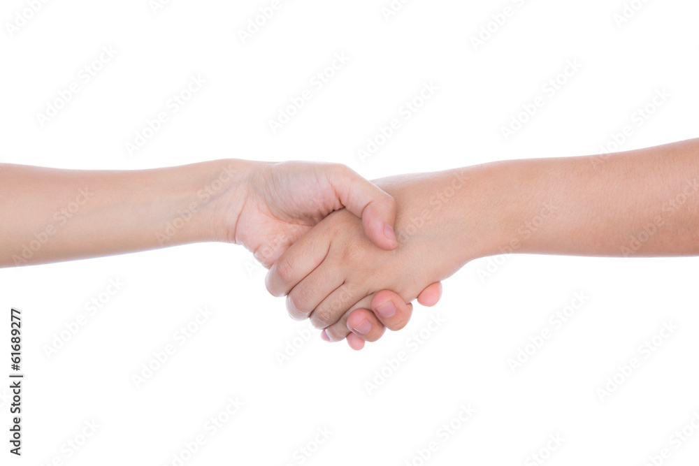 Shaking hands of two female people isolated on white background