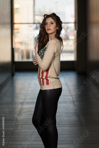 Model Wearing Leather Pants And American Flag Shirt © Jale Ibrak