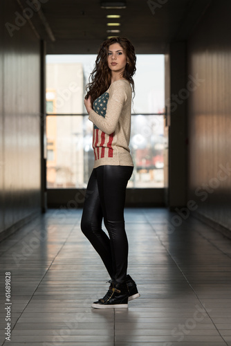 Model Wearing Leather Pants And American Flag Shirt © Jale Ibrak