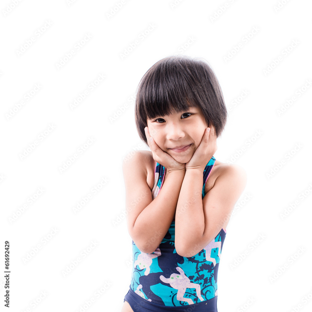 Cute smiling little girl in swimsuit isolated on white backgroun Cute smiling little girl in swimsuit isolated on white backgroun