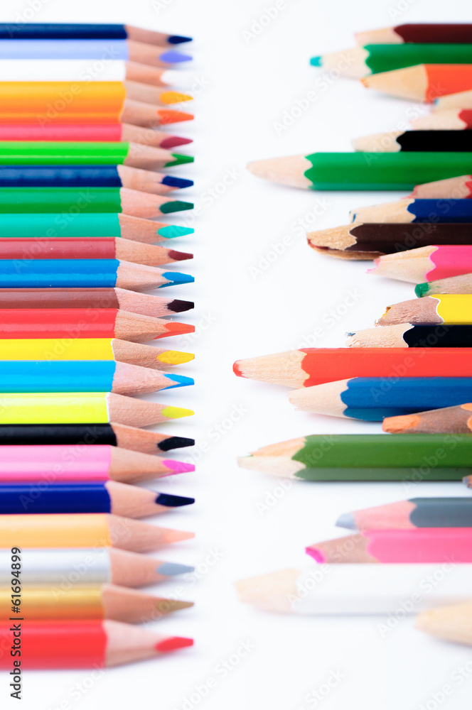 Naklejka premium New and old color pencils in front of each other