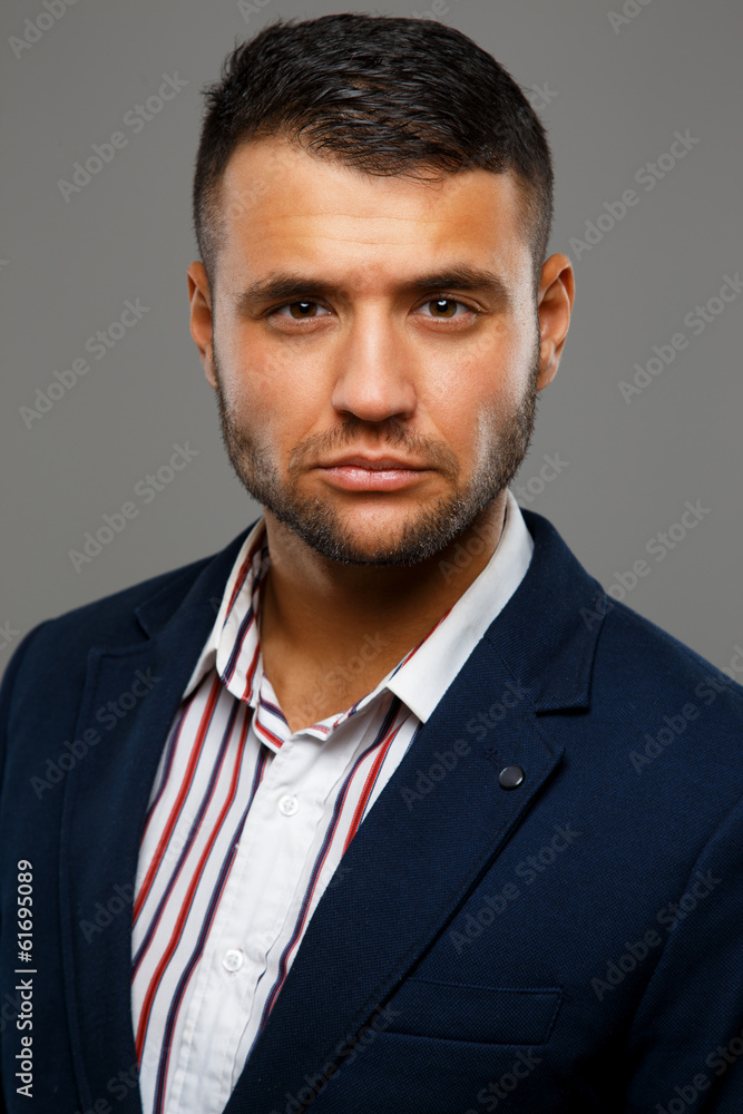 Serious man in a shirt and a jacket Serious man in a shirt and a jacket