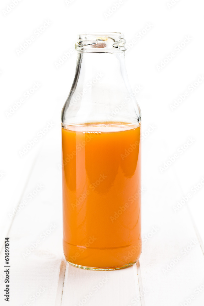 bottle of carrot juice bottle of carrot juice