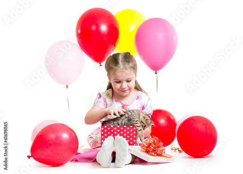 happy kid with kitten in gi...