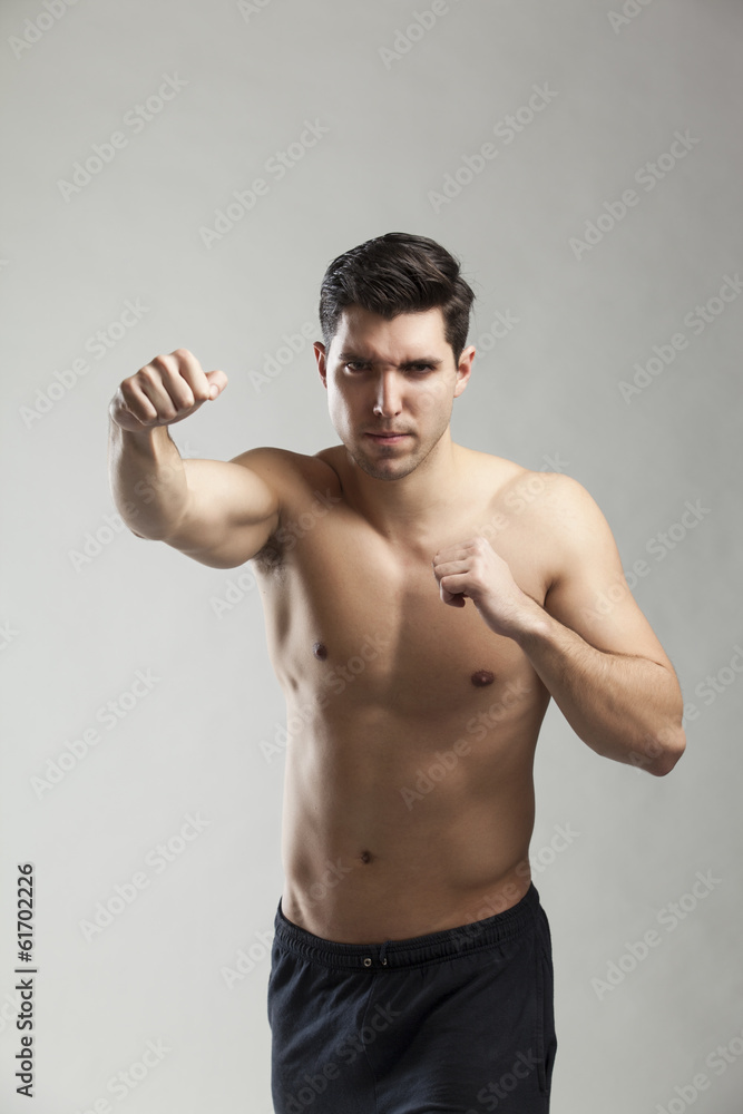 half naked man lifting weights half naked man lifting weights