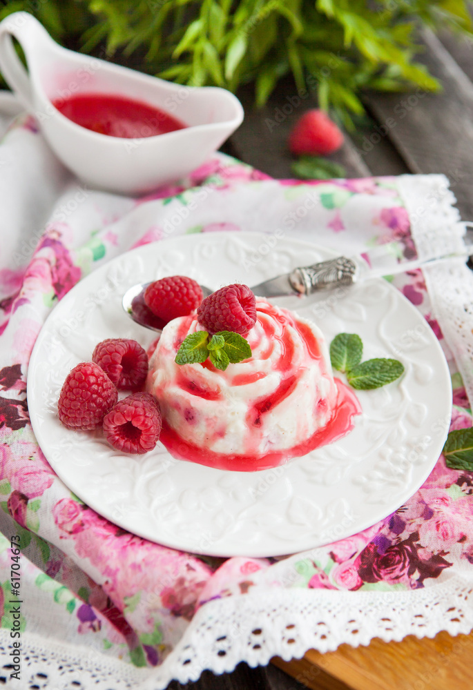 Delicious dessert with raspberry sauce and fresh berries Delicious dessert with raspberry sauce and fresh berries