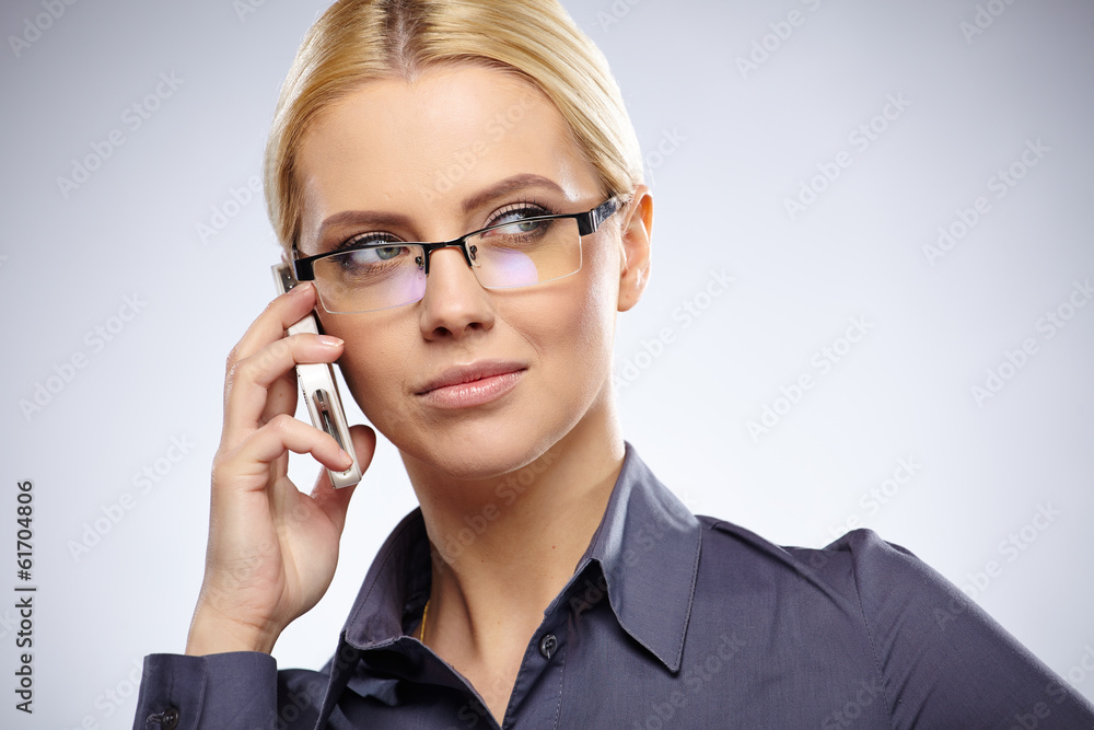 Portrait of smiling business woman phone talking, isolated on gr Portrait of smiling business woman phone talking, isolated on gr