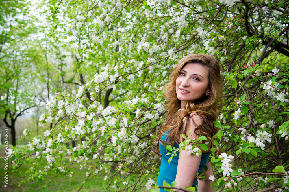 Beautiful young woman with flowers. Beautiful young woman with flowers.