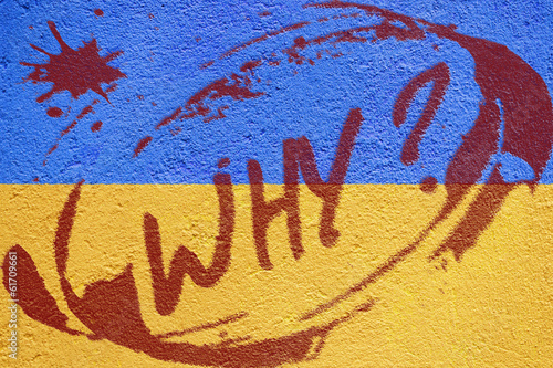 Ukraine flag painted on old concrete wall with RIOT inscription