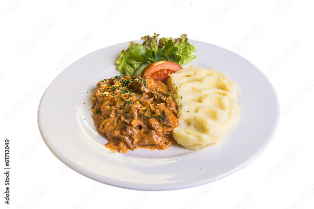 goulash with vegetable sauce and mashed potatoes goulash with vegetable sauce and mashed potatoes