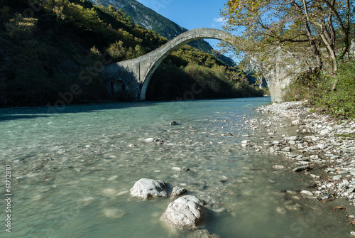 The historical Plaka bridge in Epirus, Greece photo