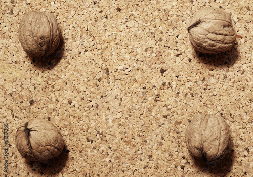 nuts on cork pad background