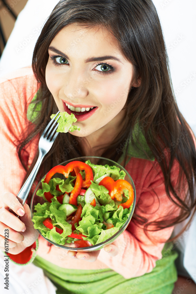 Young woman eat salad. Healthy vegetarian food. Young woman eat salad. Healthy vegetarian food.