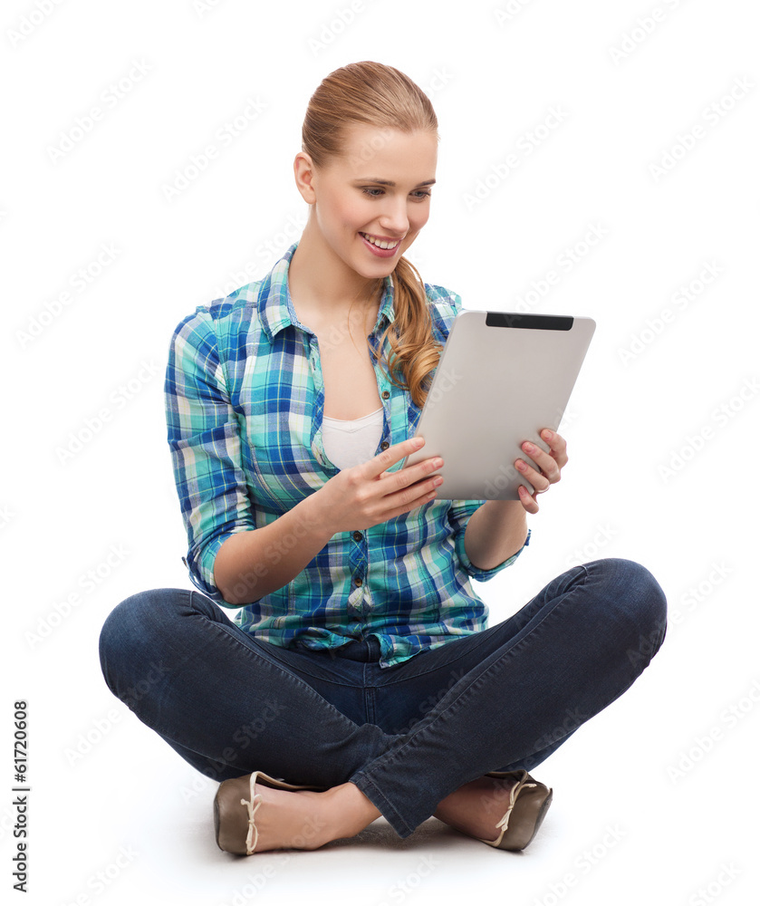 young woman in casual clothes sitting on floor young woman in casual clothes sitting on floor