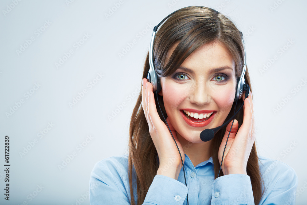 Smiling woman call center operator touching headsed. Close up b Smiling woman call center operator touching headsed. Close up b