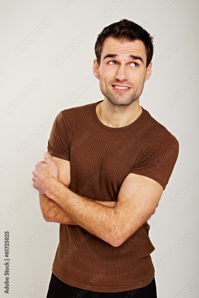 Portrait of handsome a man at brown shirt Portrait of handsome a man at brown shirt