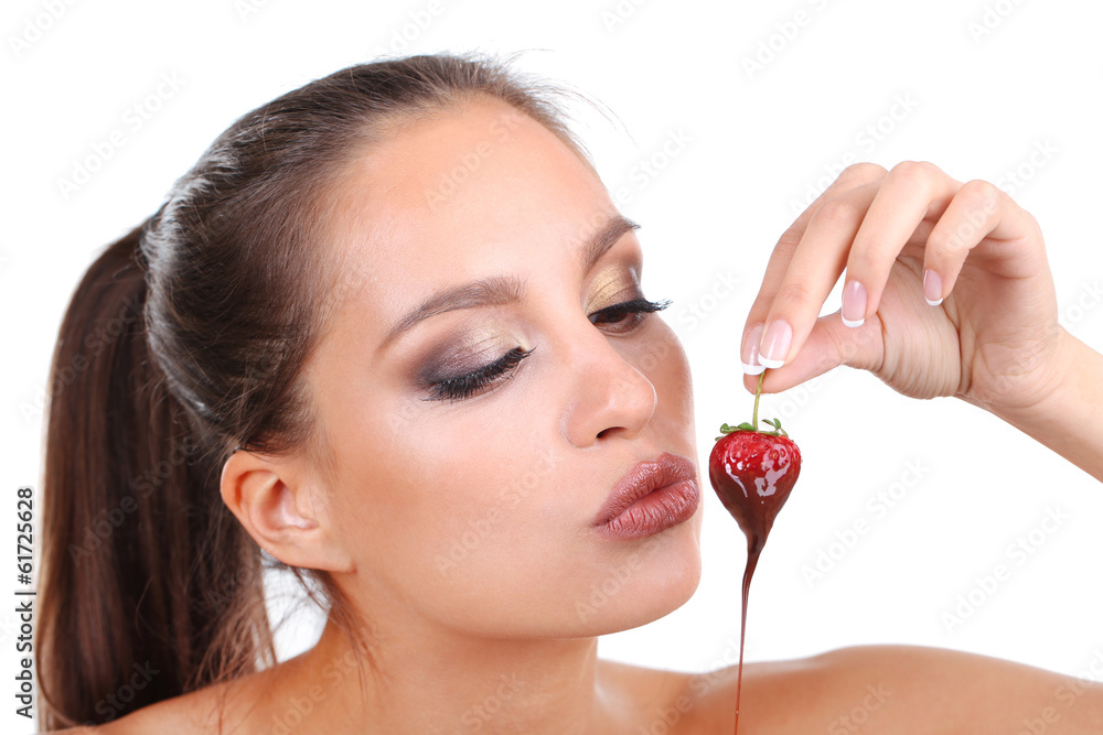 Portrait of beautiful young girl with strawberry in chocolate Portrait of beautiful young girl with strawberry in chocolate