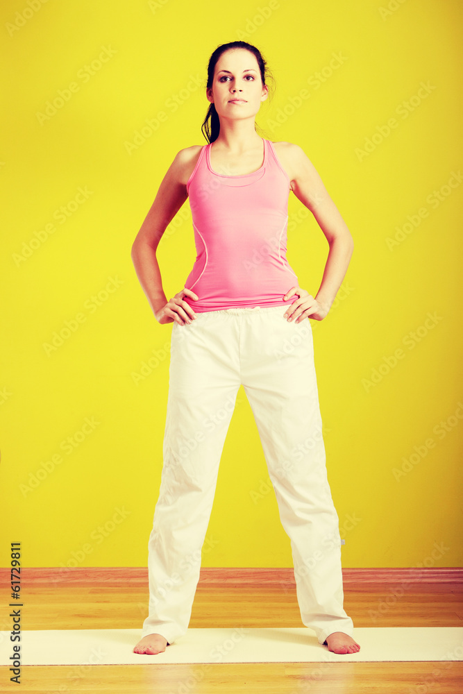 Woman exercising at home Woman exercising at home