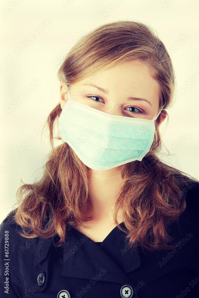 A model wearing a mask to prevent 'Swine Flu' infection. A model wearing a mask to prevent 'Swine Flu' infection.