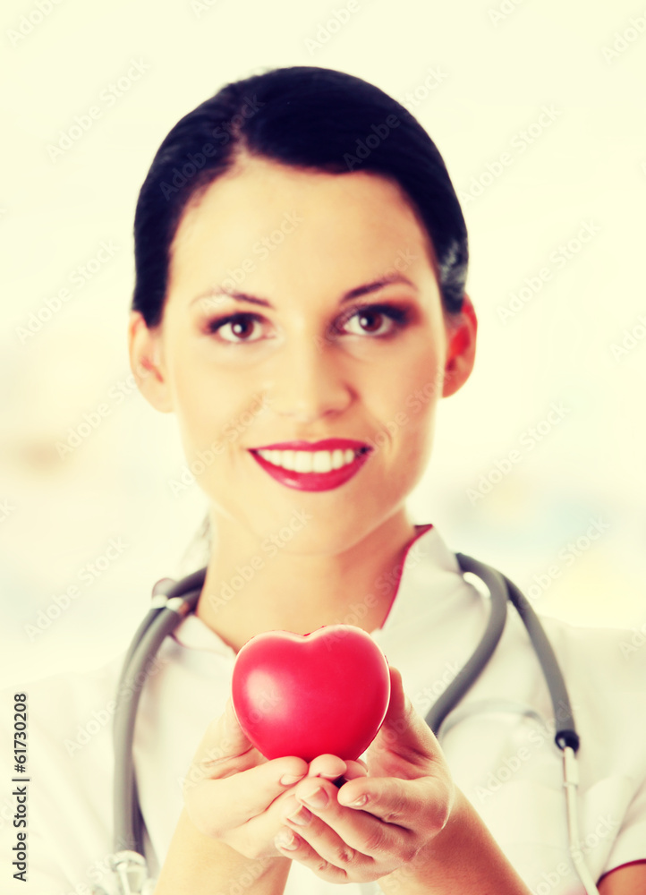 Young doctor with heart Young doctor with heart