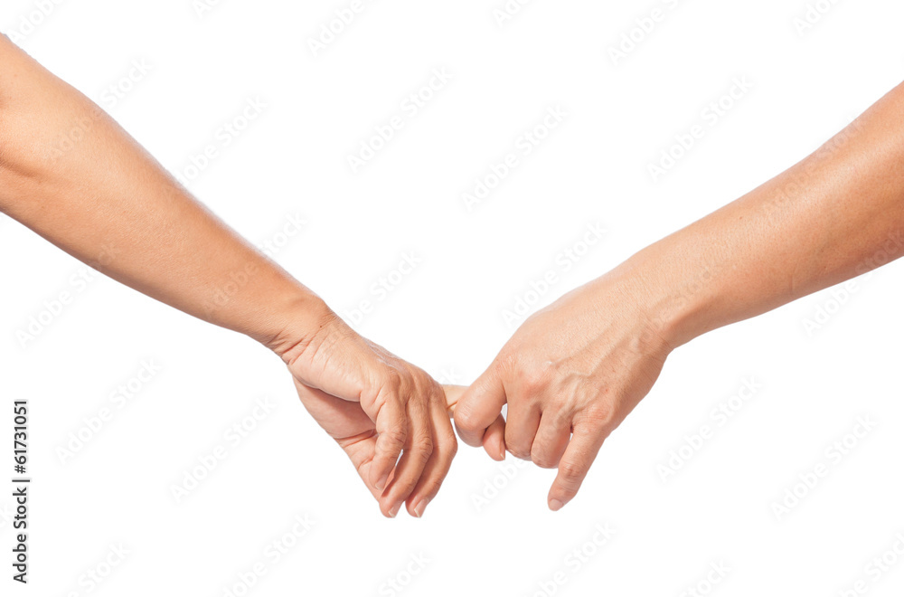 man and woman hook finger together