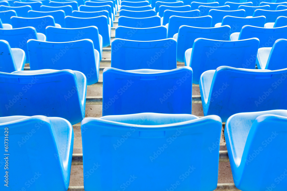 Naklejka premium Empty dark blue chairs at the football Stadium