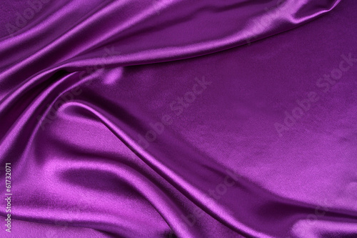 Purple silk fabric texture background. Copy space