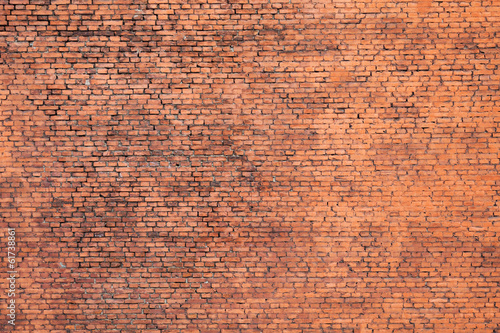 Old red brick wall small-scale background photo texture