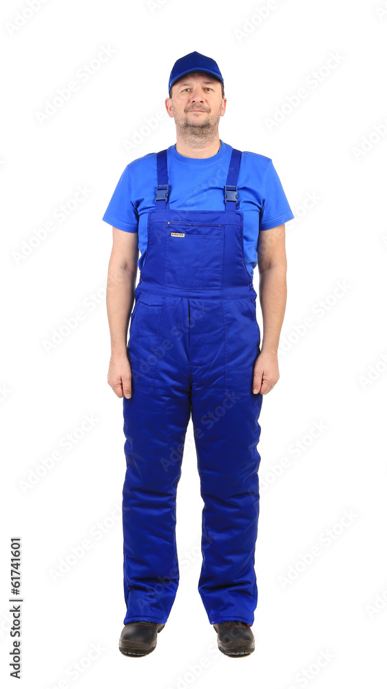 Worker in blue overalls. Worker in blue overalls.