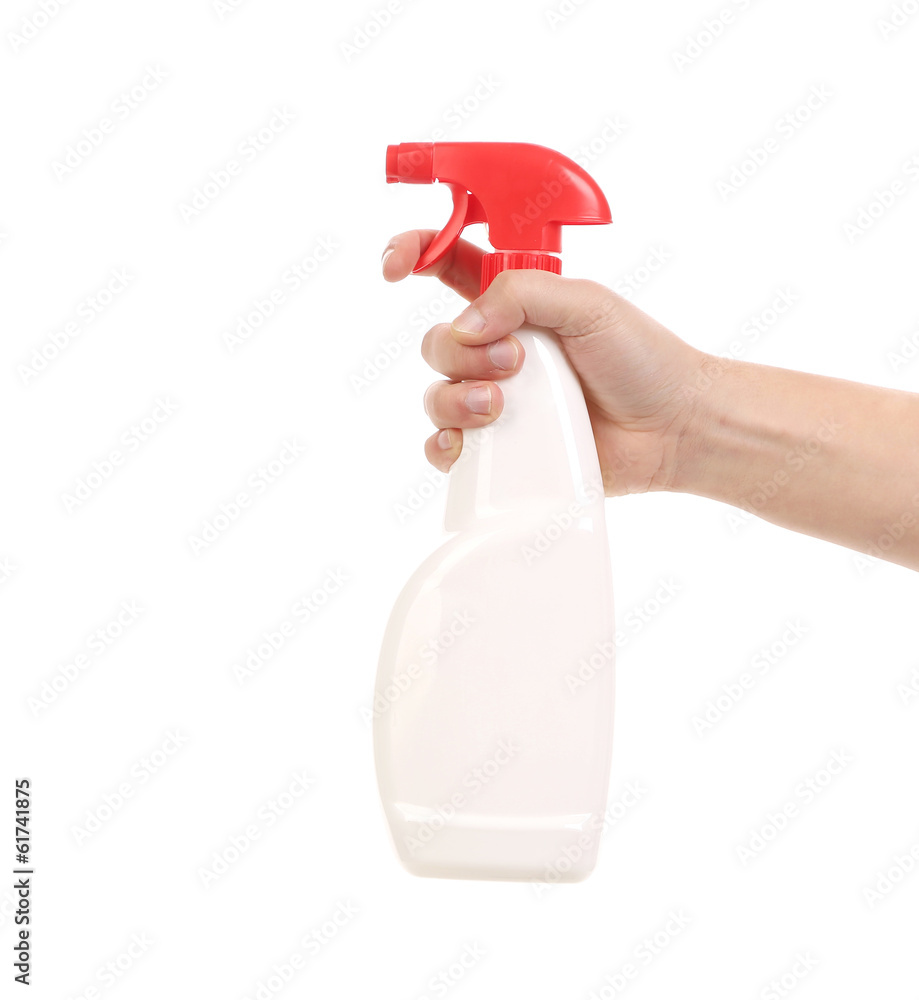 Hand holding white plastic spray bottle. Hand holding white plastic spray bottle.