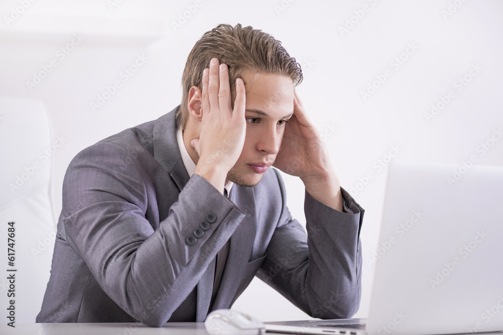 Businessman exhausted in his office Businessman exhausted in his office