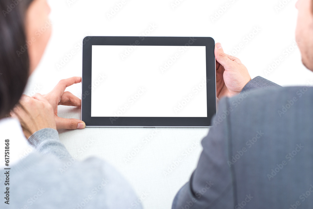 Business Couple working on tablet PC Business Couple working on tablet PC