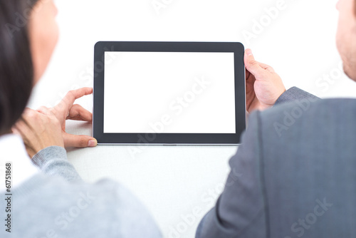 Business Couple working on tablet PC