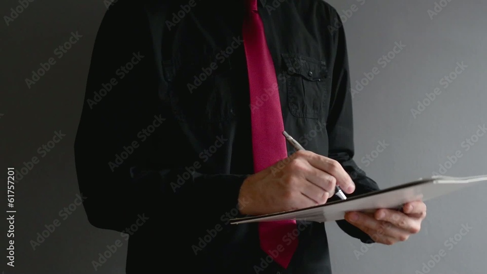 Businessman signing project documentation. Businessman signing project documentation.