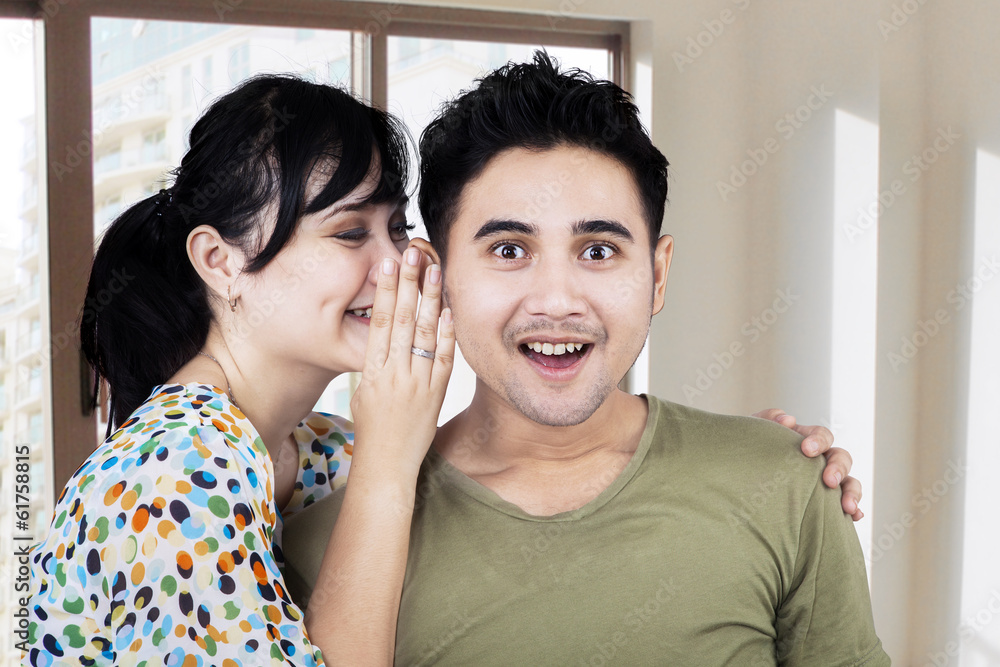 A Woman Whispering Secrets To A Man A Woman Whispering Secrets To A Man