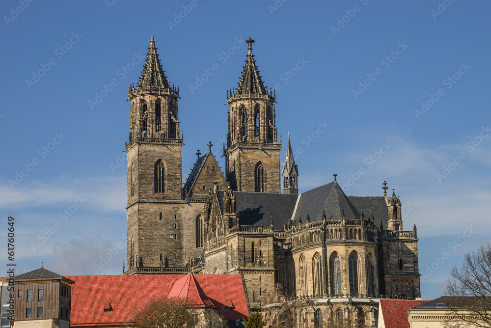 Magnificent Cathedral of Magdeburg at river Elbe with blue sky,