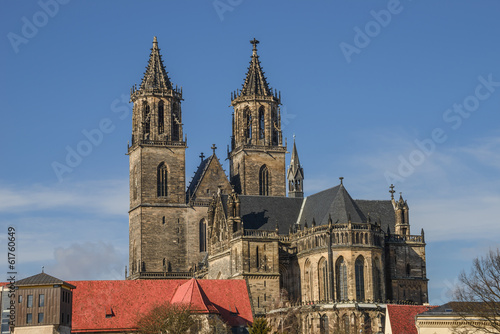 Magnificent Cathedral of Magdeburg at river Elbe with blue sky,