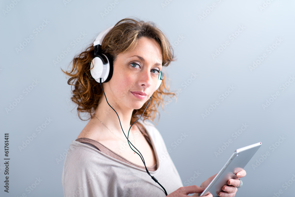 portrait of a beautiful young woman with tablet computer portrait of a beautiful young woman with tablet computer