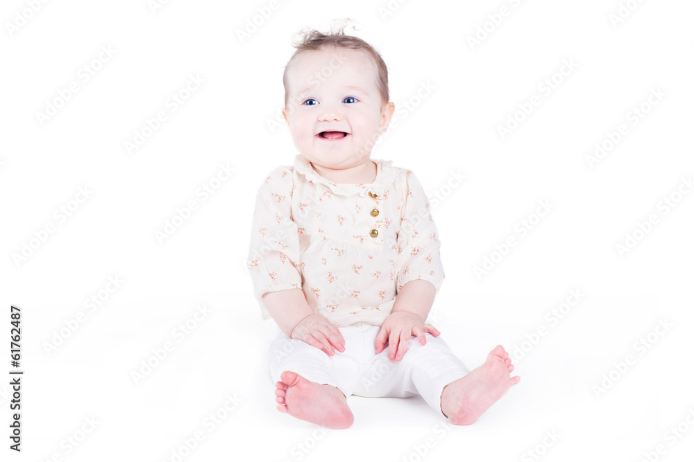 Sweet baby girl sitting and laughing Sweet baby girl sitting and laughing