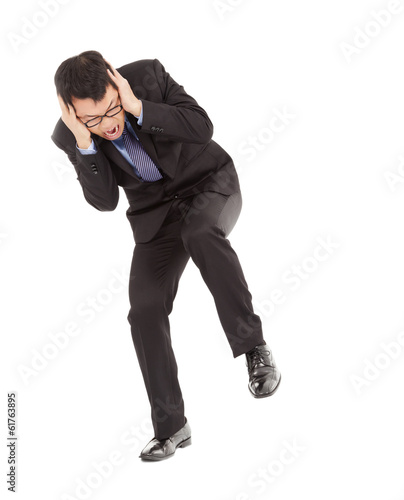 Businessmen terrified to hands over his ears