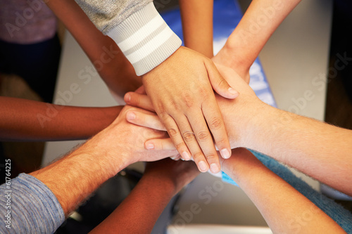 Hands From Young People Of Different Races Joined Together