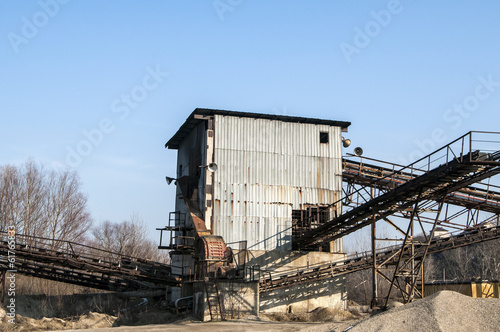 Obsolete facility for gravel sorting in sunny day © varbenov